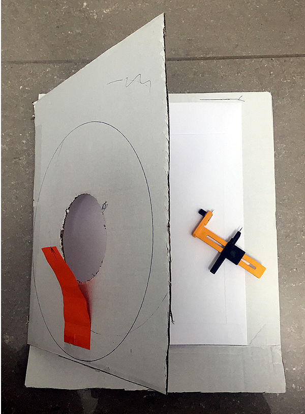 envelope inside cardboard holder